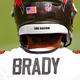 The message “End Racism” is seen on the helmet of Tom Brady #12 of the Tampa Bay Buccaneers as he warms up before the game against the Carolina Panthers at Raymond James Stadium on September 20, 2020 in Tampa, Florida.